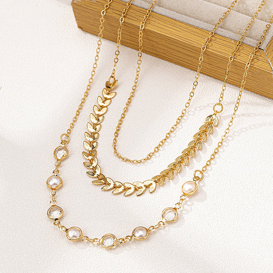 3 European and American fashion temperament simple folding style metal leaves pearl circle stitching ladies necklace suit
