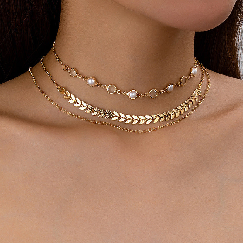 3 European and American fashion temperament simple folding style metal leaves pearl circle stitching ladies necklace suit