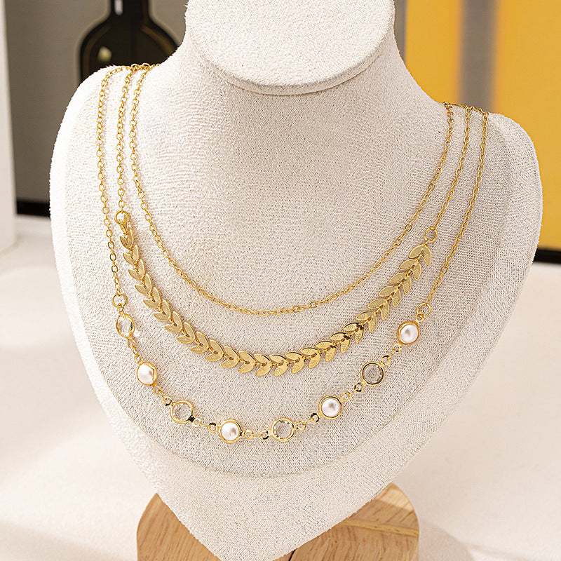 3 European and American fashion temperament simple folding style metal leaves pearl circle stitching ladies necklace suit
